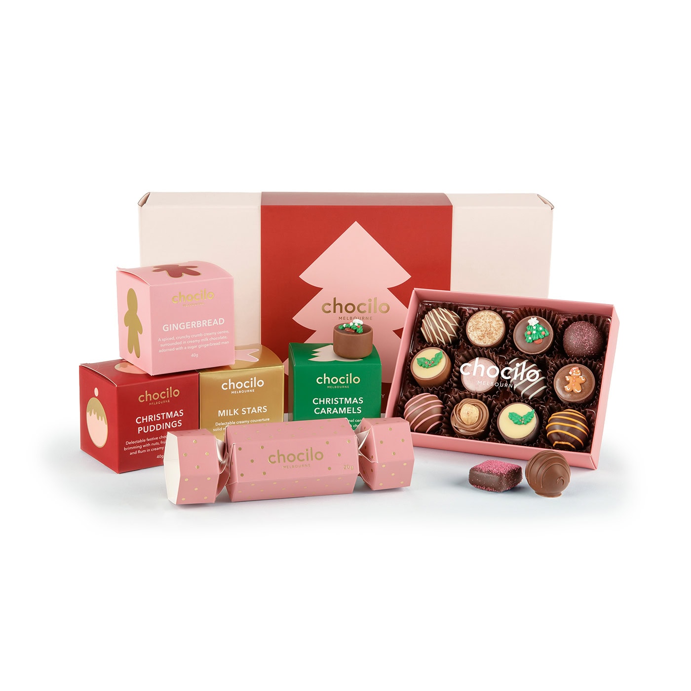 Chocilo Melbourne Christmas "Jingle all the Way" Chocolate Gift Hamper featuring 12 pack of assorted premium chocolates, festive pink and gold bonbon with milk chocolates, 4 x Christmas chocolate gift cubes.