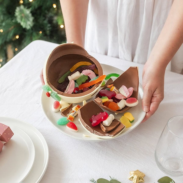 Chocilo Melbourne Christmas Premium Milk and White Chocolate Plum Pudding Smash Pinata Cake filled with fresh lollies.