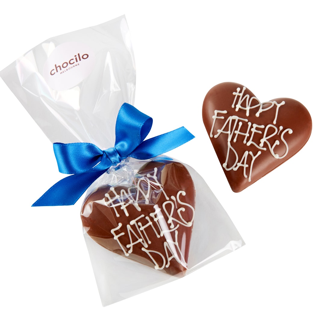 Chocilo Melbourne Father's Day Praline heart in Milk Chocolate. Wrapped in cello gift bag, finished with satin blue ribbon.
