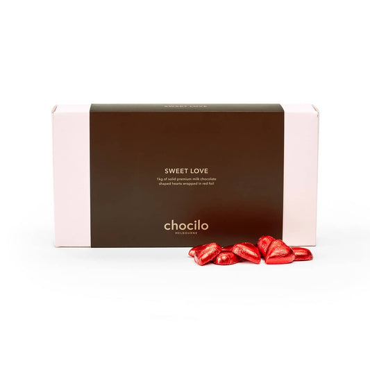 Chocilo Melbourne Premium Milk Chocolate Solid Hearts wrapped in red foil, packaged in a blush pink gift box hamper.