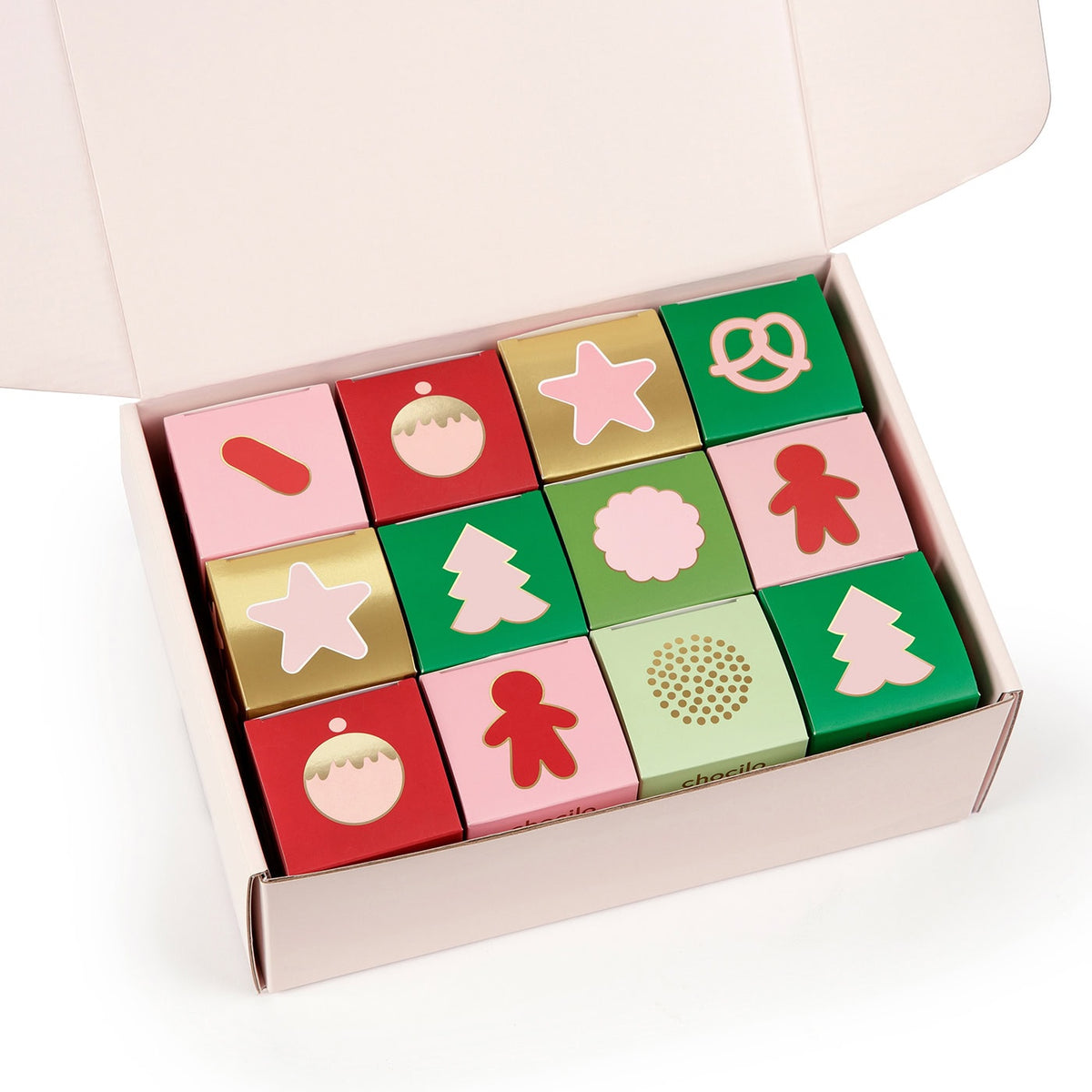 A Chocilo Melbourne Christmas Gift Hamper filled with 12 chocolate treat gift cubes. The treats include chocolate Stars, Christmas Caramels, Christmas Gingerbread, Christmas Plum Pudding, Liquorice Bullets, Speckles, Caramelised Popcorn, and Pretzels.