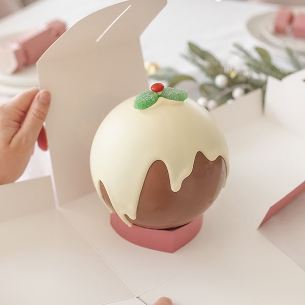 Chocilo Melbourne Christmas Premium Milk and White Chocolate Plum Pudding Smash Pinata Cake filled with fresh lollies.
