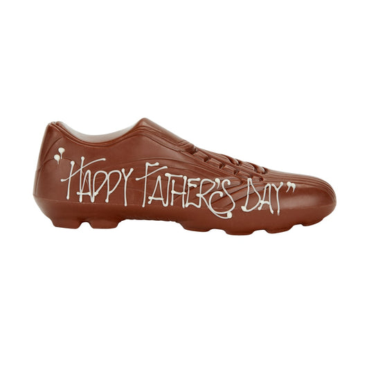 Happy Father's Day handmade milk chocolate football boot. Wrapped in cello, finished with a blue satin ribbon.