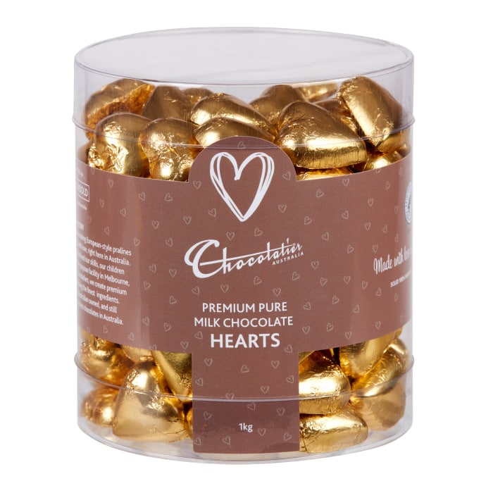 Chocolatier Australia Gold Foiled Hearts in Milk Chocolate. Packed into a clear tub for display.