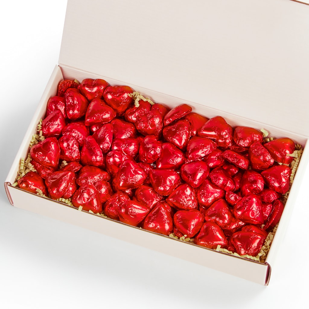 Chocilo Melbourne Premium Milk Chocolate Solid Hearts wrapped in red foil, packed in a blush pink gift box hamper.
