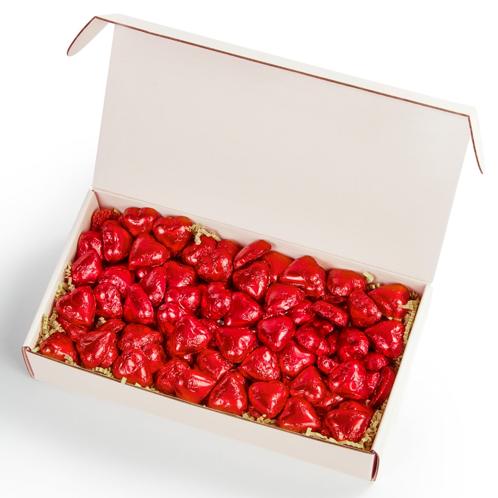 Chocilo Melbourne Premium Milk Chocolate Solid Hearts wrapped in red foil, packed in a blush pink gift box hamper.